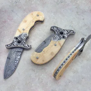 Fossil ivory button lock folding knife