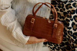 <tc>Sac à main en cuir tannée à texture Paris</tc>