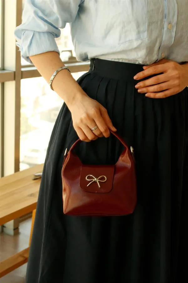 <tc>Sac à main pour femme Ribbon Bordeaux.

</tc>